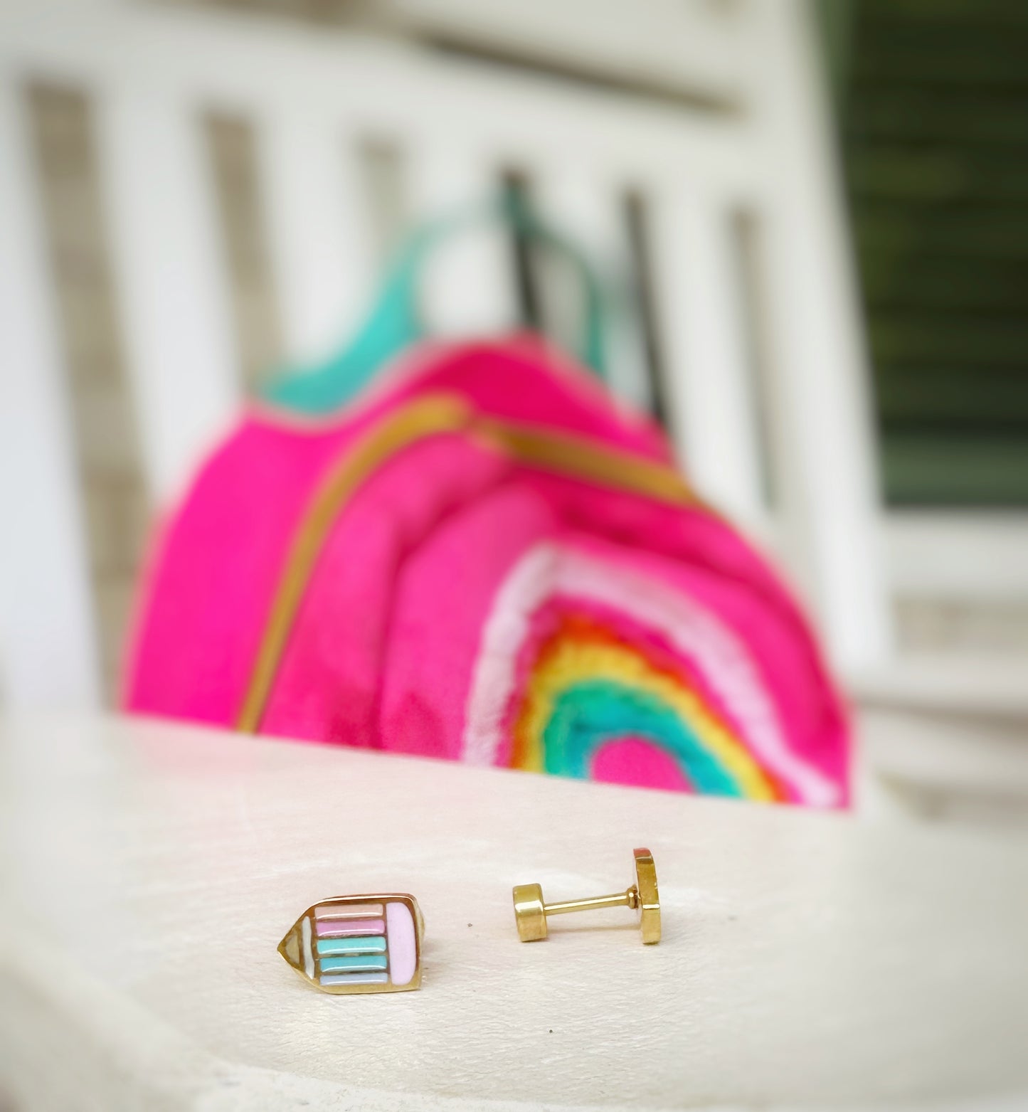 rainbow pencil stud earrings made of surgical stainless steel, they are hypoallergenic and will not irritate ears. The screw on backs keep the earrings secure and comfortable. They are perfecy for back to school or for teacher gifts